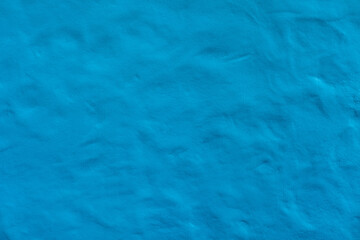 Obraz premium Rough surface of ocean blue concrete which show the gradient and detail of material texture. Ideal for wallpaper, seascape background.