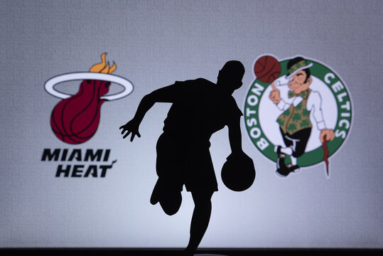 ORLANDO, USA. SEPTEMBER. 19: NBA Conference final Miami Heat vs. Boston Celtics. Season 2020 in bubble. Basketball player silhouette. Teams logo on the big screen in background.