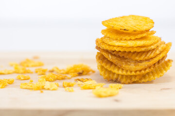 Close up potato chips on white background (food concept)