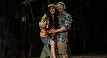 Summer holidays, love, romance and people concept. Couple in love. Forest background. Sensual. Smile. Fun. 