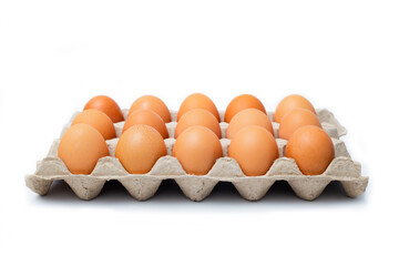 Close-up view of raw chicken eggs on white background. Raw chicken eggs in egg box organic