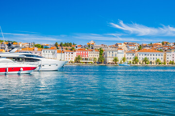Obraz premium Seafront and yachts in town of Mali Losinj on the island of Losinj, Adriatic coast in Croatia