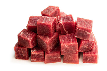 Cubes of raw beef meat isolated on white