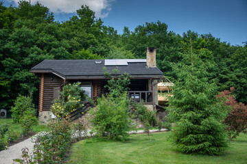 Fototapeta na wymiar Romania,wooden cottage ,chalet in the forest in Romania,eastern Transylvania, Bistrița ,2020