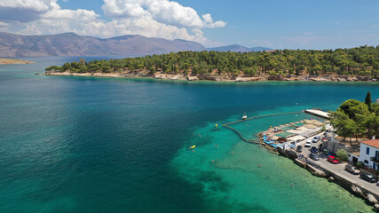 Aerial drone photo of famous seaside area and forest of Kentri in picturesque village and port of Galaxidi, Fokida, Greece