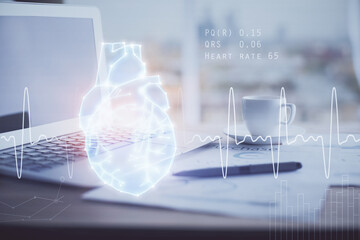 Desktop computer background and heart drawing. Double exposure. Medical study and healthcare concept.