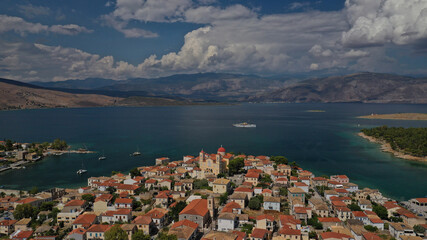Fototapeta premium Aerial drone photo of beautiful picturesque and historic seaside village of Galaxidi, Fokida, Greece