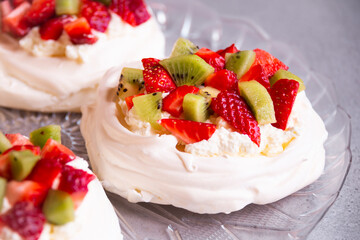 Delicious Pavlova cake with meringue and fresh fruit