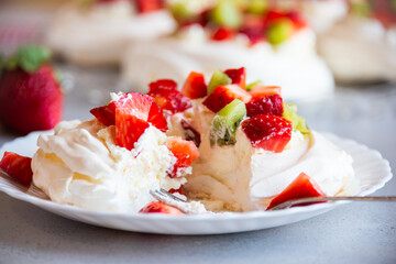 Delicious Pavlova cake with meringue and fresh fruit