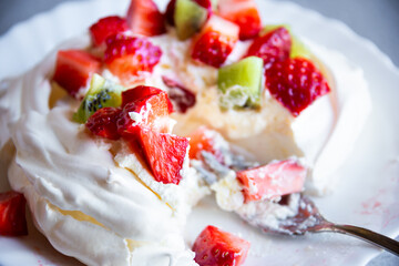 Delicious Pavlova cake with meringue and fresh fruit