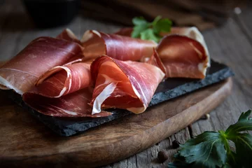 Fotobehang Italian prosciutto or jamon with rosemary, raw ham © Maresol