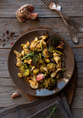 Cauliflower, broccoli and other cooked vegetables with rosemary