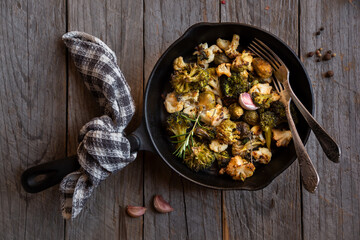 Cauliflower, broccoli and other cooked vegetables with rosemary
