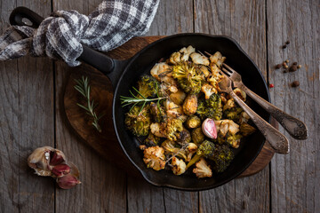 Cauliflower, broccoli and other cooked vegetables with rosemary