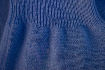 blue cashmere knitted natural sweater close up