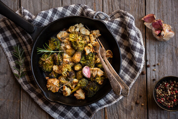 Cauliflower, broccoli and other cooked vegetables with rosemary