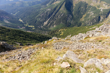 Fototapeta premium View of the valley from the highest mountain in the Giant Mountains. Czech Republic (Sněžka) and Poland (Śnieżka)