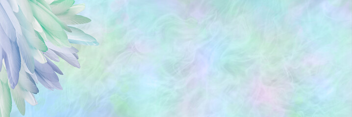 Beautiful pastel coloured ethereal feather corner message background banner - multicoloured neat pile of feathers in left corner and wide copy space with misty ethereal energy formation background
