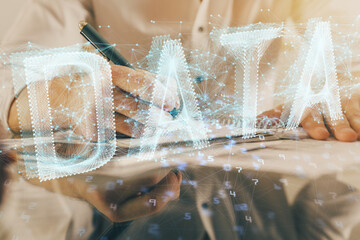 Writing man's hand with data icons.