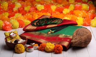 oti bharne - Indian ritual of offering a sari and a blouse piece along with coconut, haldi kumkum,...