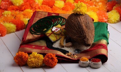 oti bharne - Indian ritual of offering a sari and a blouse piece along with coconut, haldi kumkum,...