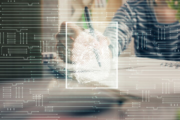Blue fingerprint hologram over hands taking notes background. Concept of security. Double exposure