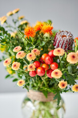 Series, step by step installation of flowers in a vase. Flowers bunch, set for home. Fresh cut flowers for decoration home. European floral shop. Delivery fresh cut flower.