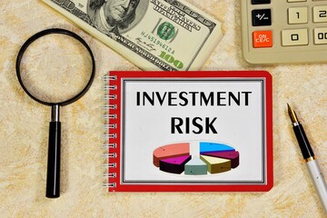 Investment risks - text label in the folder. Planning a strategy for successful placement of...
