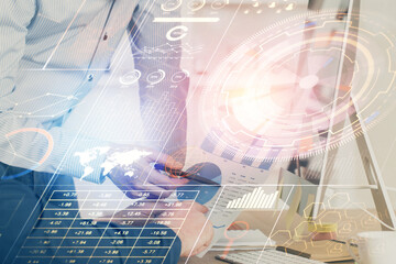 Obraz premium Multi exposure of tech drawings with man working on computer background. Concept of innovation.