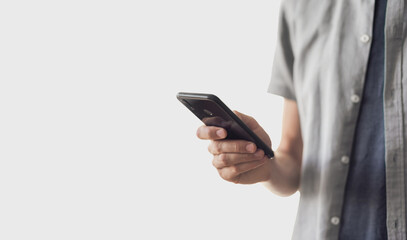 Close-up photo of male hand with smartphone, young man using phone panoramic banner, Communication, connection, business, people, technology concept