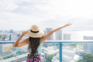 Fototapeta premium Portrait beautiful young asian woman around balcony with view