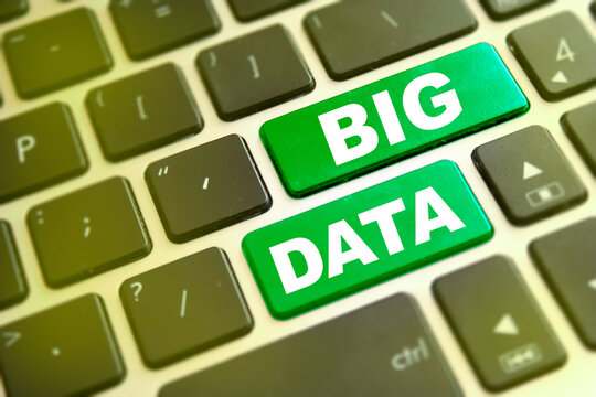 Note BIG DATA writting on green button on computer keyboard. Big data
