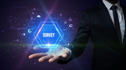 Man hand holding SURVEY inscription, social media concept