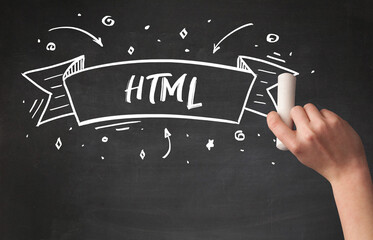 Hand drawing HTML abbreviation with white chalk on blackboard