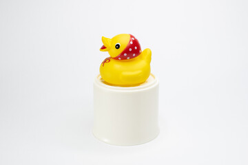 yellow rubber duck on white background