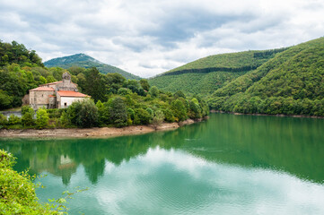 Fototapeta premium landscape with lake and a house