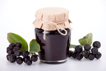 Chokeberry jam in a glass jar
