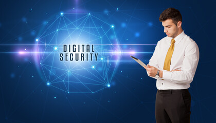 Businessman thinking about security solutions with DIGITAL SECURITY inscription