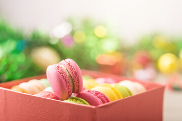 Macaronc mixed colorful in the present box for gift in warm tone celebration