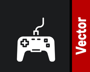White Gamepad icon isolated on black background. Game controller. Vector.