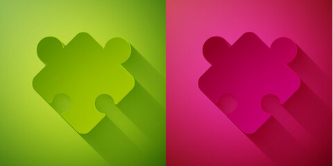 Paper cut Puzzle pieces toy icon isolated on green and pink background. Paper art style. Vector.