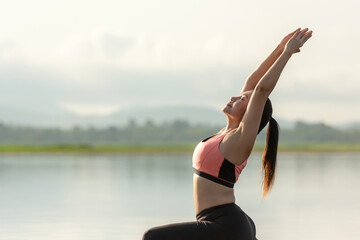 Fototapeta na wymiar Yoga women lifestyle exercise and pose for healthy life. Young girl or people pose balance body vital zen and meditation for workout sunrise morning nature background.