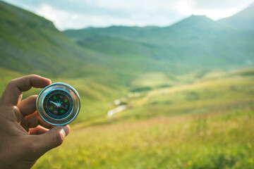 compass and green valley