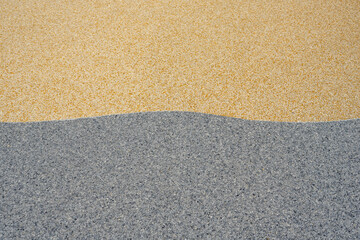  Tiny gravel texture on grey and beige concrete wall. Texture background seamless gravel floor.