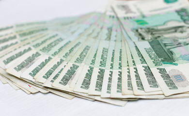 Scattered Russian 1000 rubles banknotes closeup