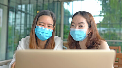 Business asian workers wear masks