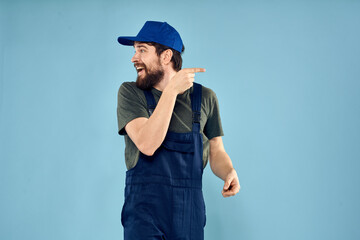 Fototapeta premium Man in working uniform emotions in life delivery service work