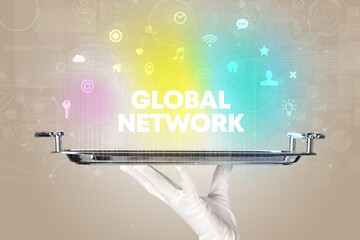 Waiter serving social networking with GLOBAL NETWORK inscription, new media concept
