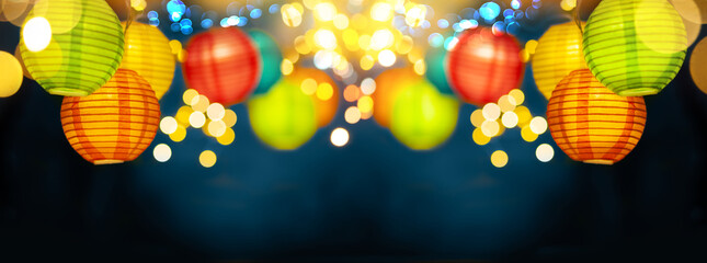 Festive background with colorful lights garland and bright bokeh. Holiday light decor. Celebration...