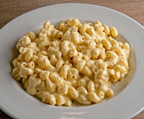 Macaroni & cheese: with truffle cream sauce Monterey jack, parmesan & asiago cheeses. 